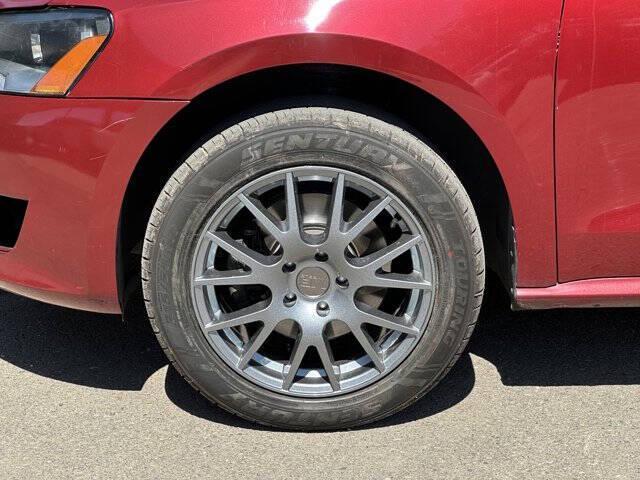 Photo of 2015 Fortana Red Volkswagen Passat
