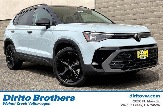 Photo of 2025 Monument Gray w/Deep Black Roof Volkswagen Taos
