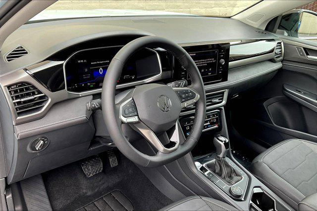 Photo of 2025 Monument Gray w/Deep Black Roof Volkswagen Taos