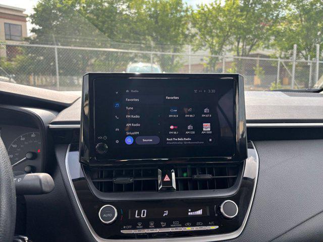 Photo of 2024 Midnight Black Metallic Toyota Corolla