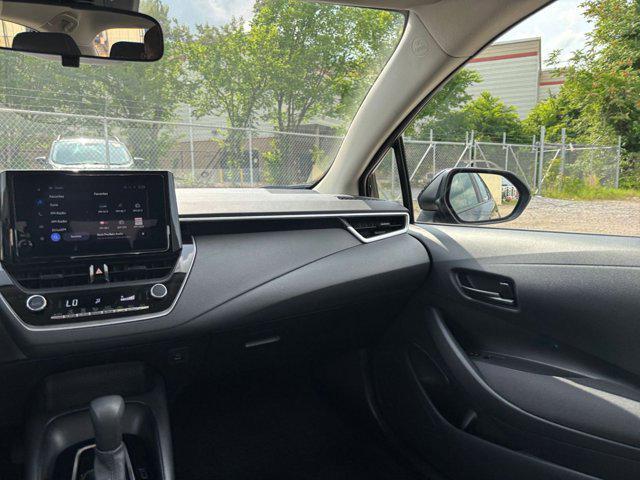 Photo of 2024 Midnight Black Metallic Toyota Corolla