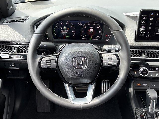 Photo of 2025 Sonic Gray Pearl Honda Civic Hybrid
