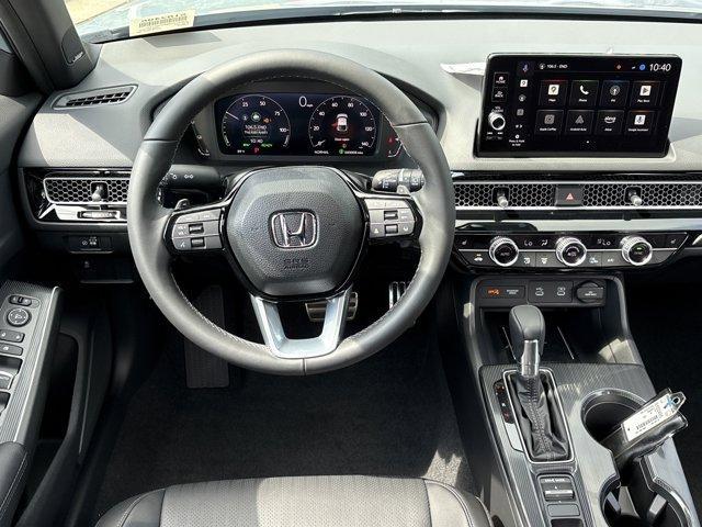 Photo of 2025 Sonic Gray Pearl Honda Civic Hybrid