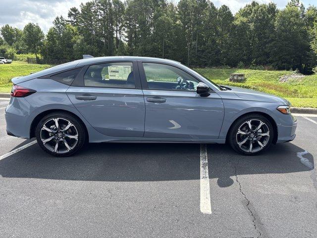 Photo of 2025 Sonic Gray Pearl Honda Civic Hybrid