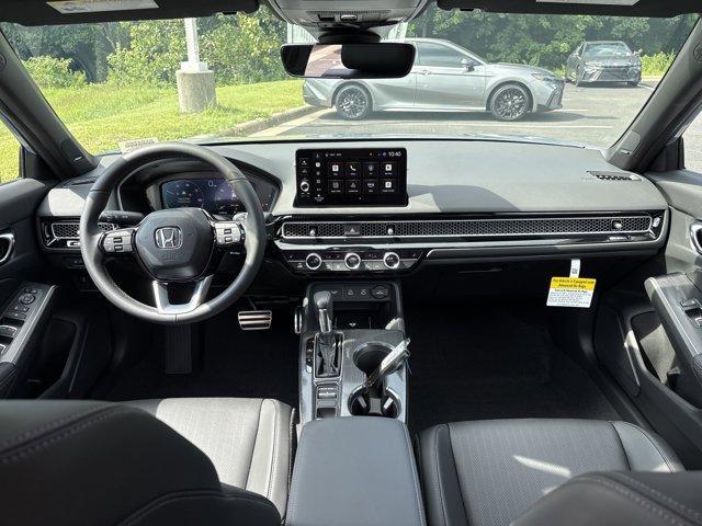 Photo of 2025 Sonic Gray Pearl Honda Civic Hybrid