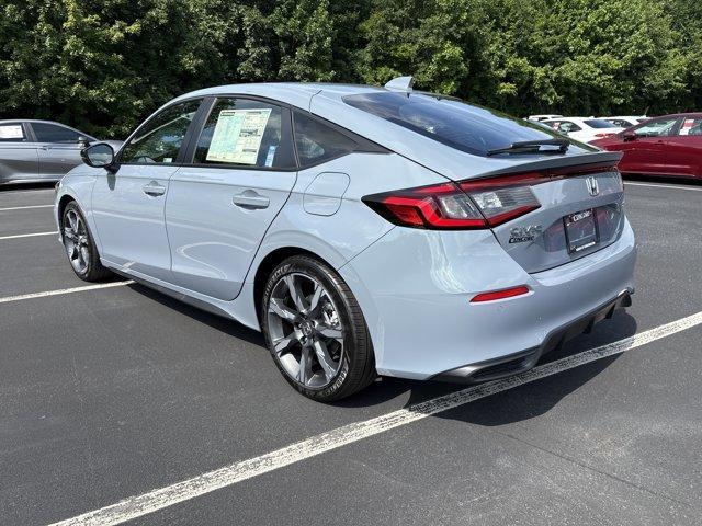 Photo of 2025 Sonic Gray Pearl Honda Civic Hybrid