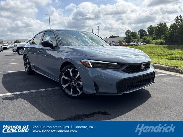 Photo of 2025 Sonic Gray Pearl Honda Civic Hybrid