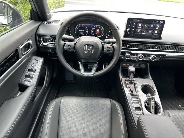 Photo of 2025 Solar Silver Metallic Honda Civic Hybrid