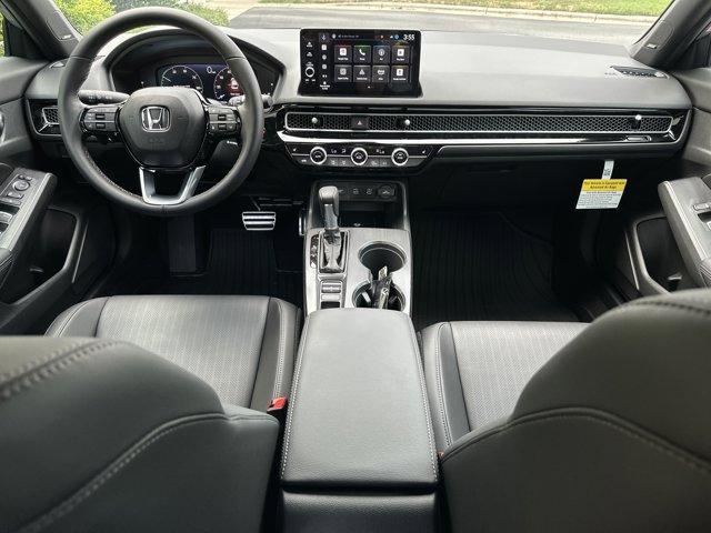 Photo of 2025 Solar Silver Metallic Honda Civic Hybrid