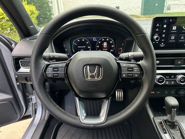 Photo of 2025 Solar Silver Metallic Honda Civic Hybrid