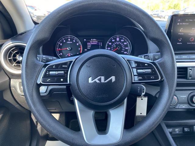 Photo of 2023 Currant Red Kia Forte