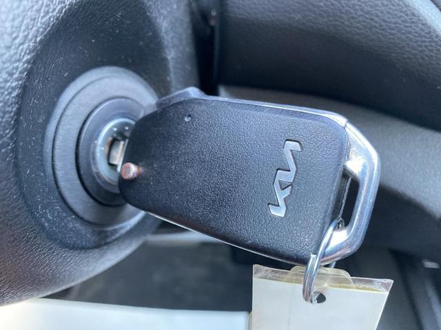 Photo of 2023 Currant Red Kia Forte