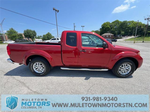 Photo of 2016 Lava Red Nissan Frontier