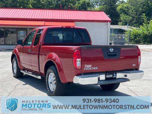 Photo of 2016 Lava Red Nissan Frontier