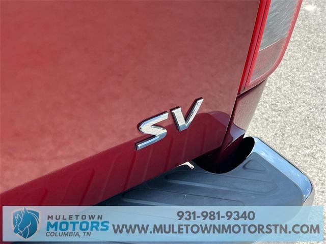 Photo of 2016 Lava Red Nissan Frontier