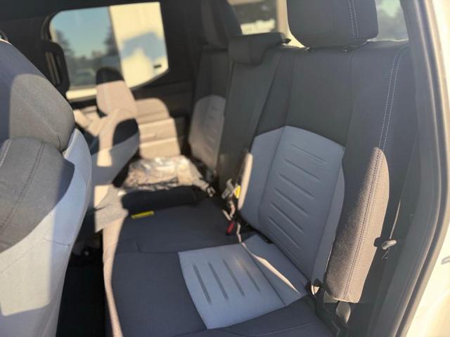 Photo of 2025 White Toyota Tacoma Hybrid