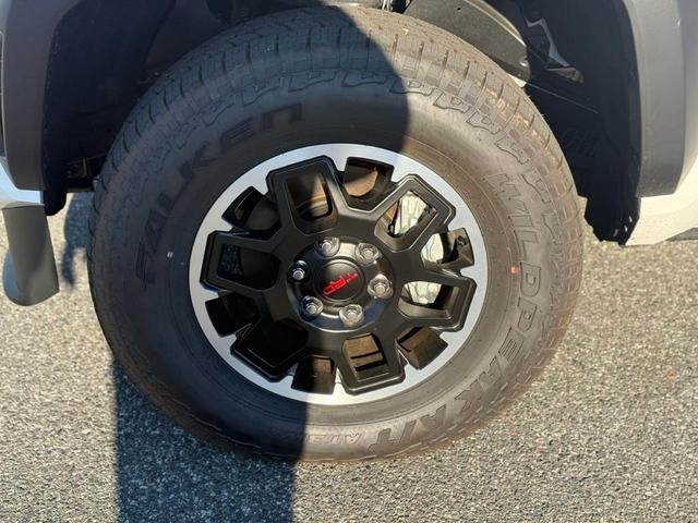 Photo of 2025 White Toyota Tacoma Hybrid