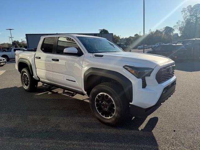 Photo of 2025 White Toyota Tacoma Hybrid