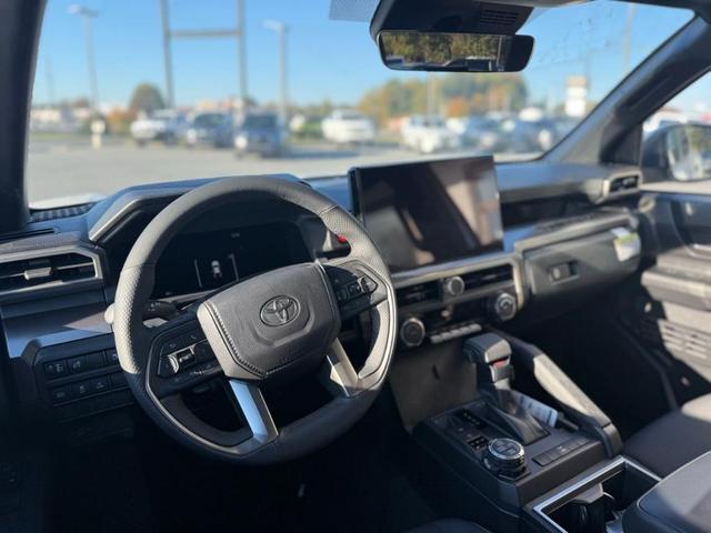 Photo of 2025 White Toyota Tacoma Hybrid