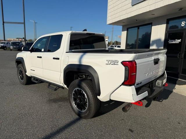 Photo of 2025 White Toyota Tacoma Hybrid