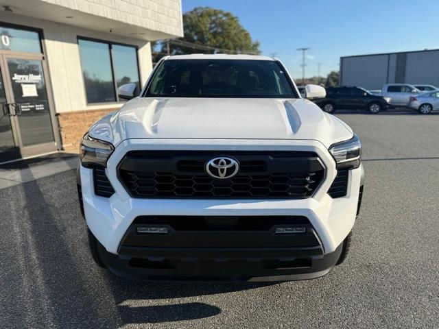 Photo of 2025 White Toyota Tacoma Hybrid