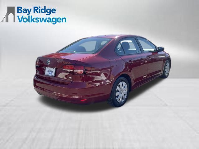 Photo of 2016 Cardinal Red Metallic Volkswagen Jetta