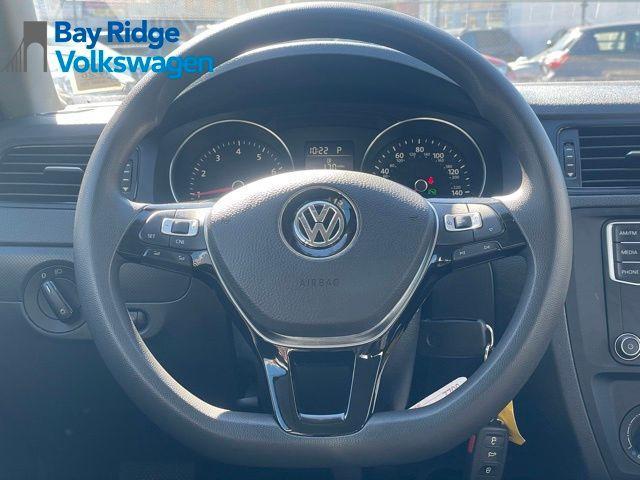 Photo of 2016 Cardinal Red Metallic Volkswagen Jetta