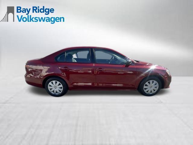 Photo of 2016 Cardinal Red Metallic Volkswagen Jetta