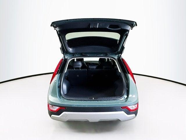 Photo of 2025 Cityscape Green Kia Niro Plug-In Hybrid