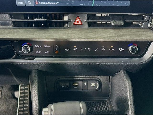 Photo of 2025 Wolf Gray/Ebony Black Roof Kia Sportage