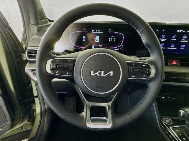 Photo of 2025 Jungle Green Kia Sportage