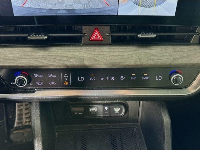 Photo of 2023 Ebony Black Kia Sportage