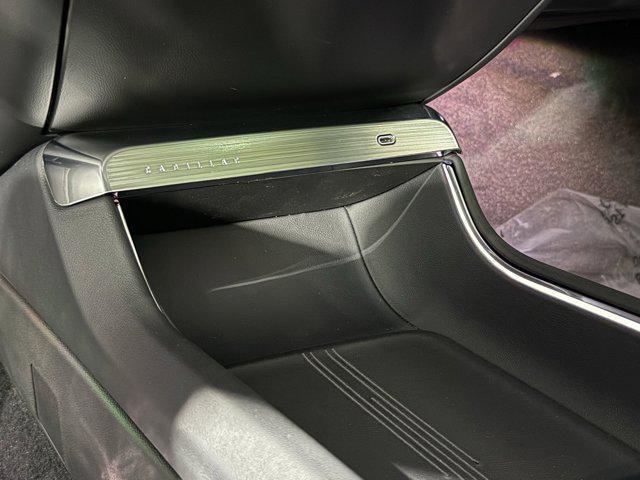 Photo of 2025 Emerald Lake Metallic Cadillac LYRIQ