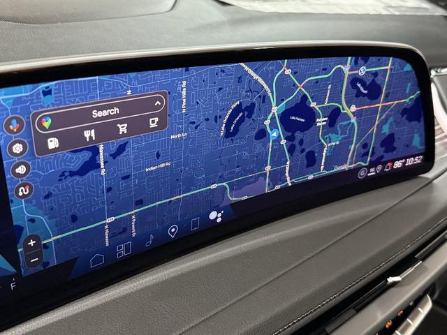 Photo of 2025 Emerald Lake Metallic Cadillac XT4