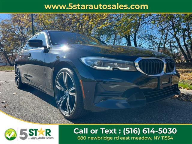 Photo of 2021 BLACK BMW 330