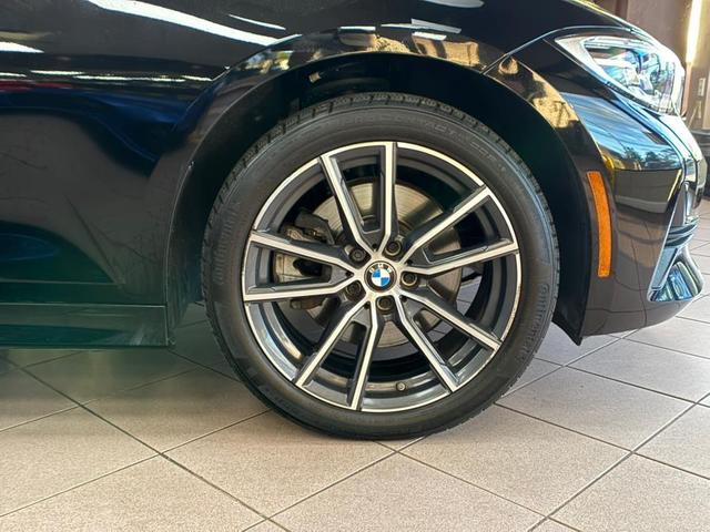 Photo of 2021 Jet Black BMW 330