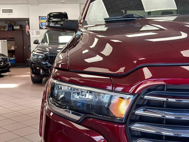 Photo of 2025 Delmonico Red Pearlcoat RAM 1500