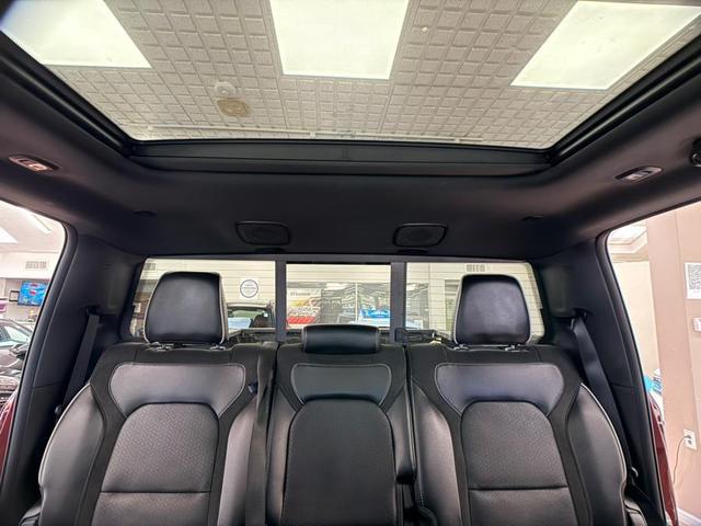 Photo of 2025 Delmonico Red Pearlcoat RAM 1500