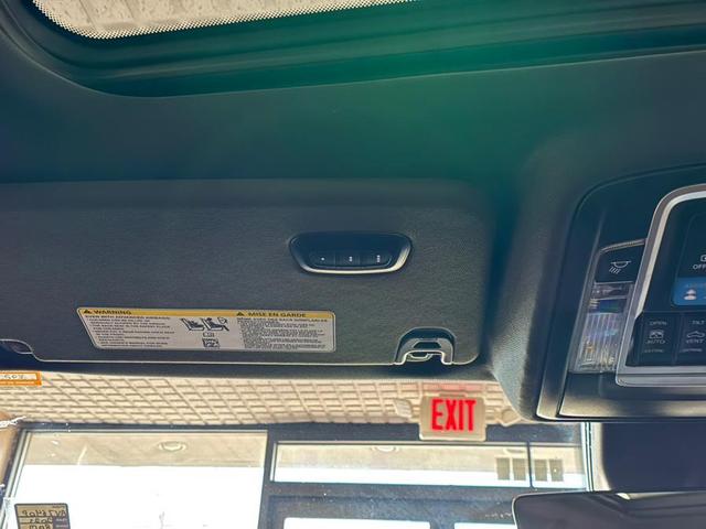 Photo of 2025 Delmonico Red Pearlcoat RAM 1500