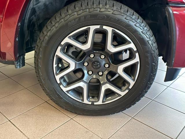 Photo of 2025 Delmonico Red Pearlcoat RAM 1500
