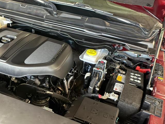 Photo of 2025 Delmonico Red Pearlcoat RAM 1500