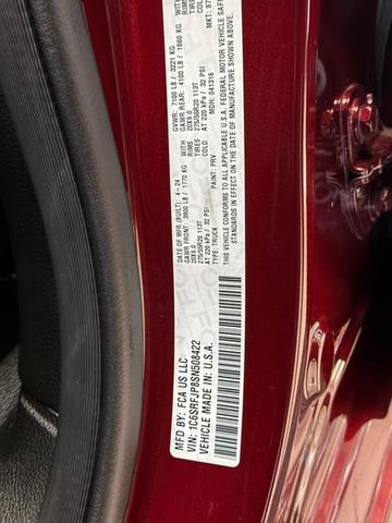 Photo of 2025 Delmonico Red Pearlcoat RAM 1500