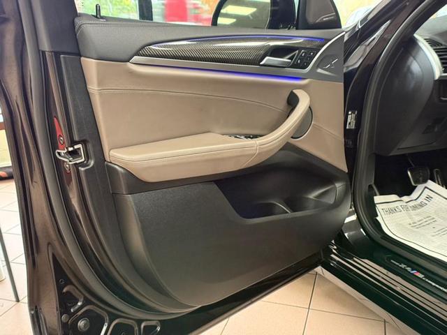 Photo of 2021 Black Sapphire Metallic BMW X4 M