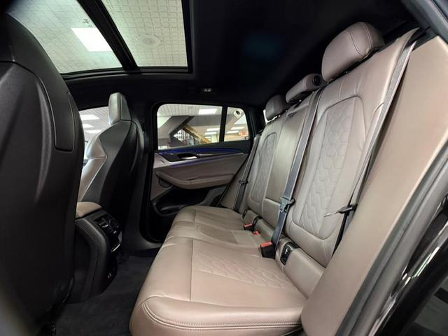 Photo of 2021 Black Sapphire Metallic BMW X4 M