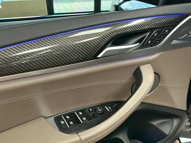 Photo of 2021 Black Sapphire Metallic BMW X4 M
