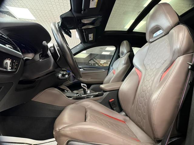 Photo of 2021 Black Sapphire Metallic BMW X4 M