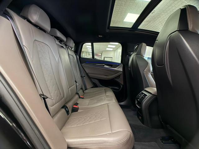 Photo of 2021 Black Sapphire Metallic BMW X4 M