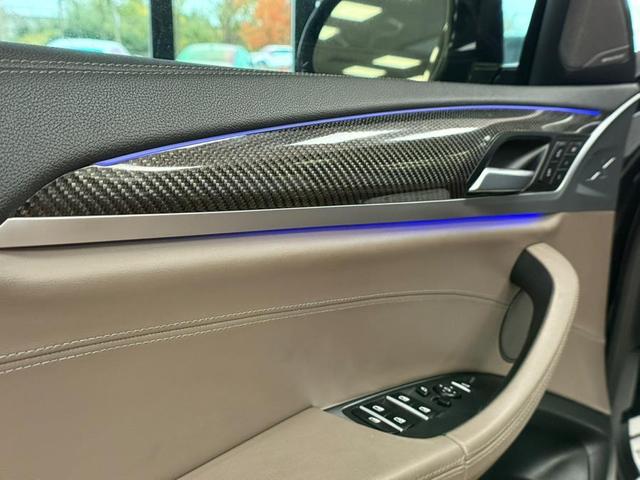 Photo of 2021 Black Sapphire Metallic BMW X4 M
