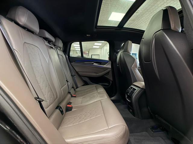Photo of 2021 Black Sapphire Metallic BMW X4 M