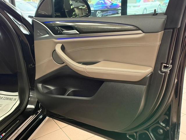 Photo of 2021 Black Sapphire Metallic BMW X4 M